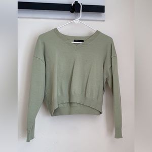 green v neck sweater
